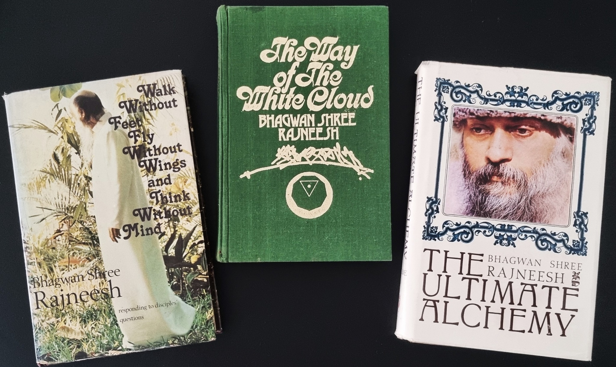 Three early editions of Osho books